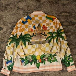 This is a silk and exclusive Casablanca button down shirt.